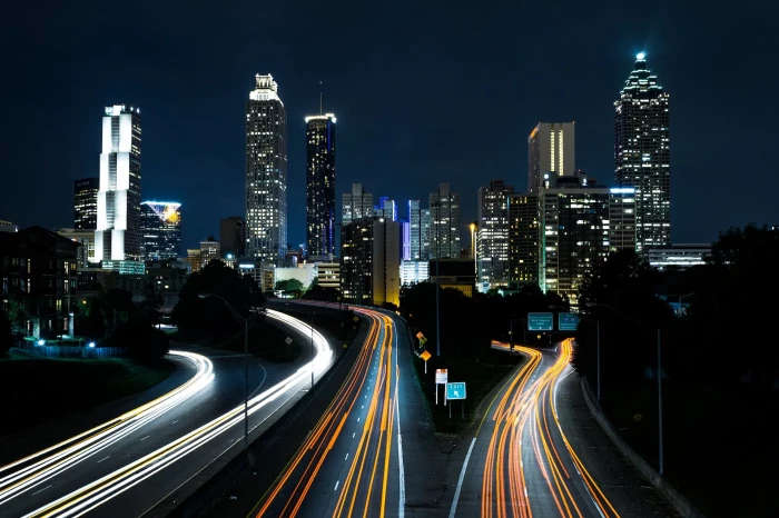 time lapse of cars in the city at night